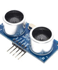 Ultrasonic Distance Sensor Module Replacement SR04 For Arduino 5V 5 Pin 2cm To 450cm Range High Precision Up To 0.3cm Low Power Under 2mA Breadboard Friendly 45x21mm Perfect For DIY Robotics And Arduino Projects. Blue PCB ultrasonic distance sensor module with dual transducers and 5-pin header for Arduino.