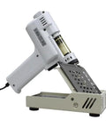 Desoldering Gun S-993A 110V 100W Vacuum Solder Sucker For Lead Free PCBs resting in a metal stand, side view