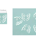 Dang Good Craft Paper Punch With Delicate Flower And Butterfly Designs, cuts butterfly shapes 1.5"x1.75", on teal background.