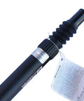 Close-up of 27.2mm Suspension Seatpost Shock Absorber for Road Bikes, showing black coil spring and warranty tag attached.