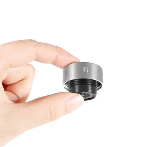 Hand holding a silver component from the 2-Pack 630-7500 Vacuum Breaker Repair Kit For Anti-Siphon Wall Hydrants, Easy Diy Fix, Fits 400/500 Series And 90 Valve, Premium Replacement Parts To Stop Leaks.