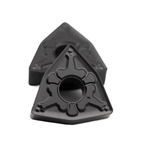 Super Hard Indexable Carbide Lathe Inserts 10 Pounds WNMG080408 TM TT4125 for steel with a triangular design.