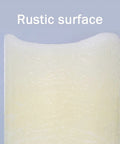Close-up of rustic surface on ivory Flickering Flameless LED Candles Real Wax Pillar Set Of 6 With 10 Key Remote Control.