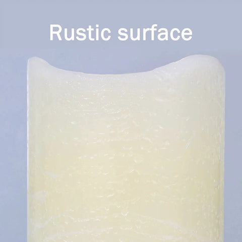 Close-up of rustic surface on ivory Flickering Flameless LED Candles Real Wax Pillar Set Of 6 With 10 Key Remote Control.