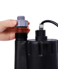 Hand removing the top cap of the Workhorse Submersible Water Pump One Third HP 2500GPH Thermoplastic Utility Sump.