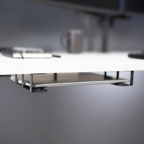 Universal Under Desk Laptop Mount With Adjustable Tablet Brackets For Hidden Computer Docking Station mounted under a white desk.