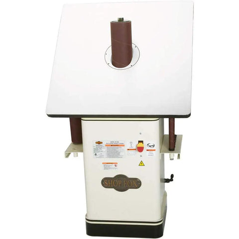 Powerful One Horsepower Oscillating Spindle Sander Featuring Rock Solid Cast Iron Table And Roomy Four Inch Dust Port For Knockout Smooth Finishes And Easy Cleanup Every Time, front view.