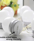 Close-up of double-sided tape on Hollywood Style LED Vanity Lights Kit With 14 Dimmable Bulbs And AC Adapter Stick On Makeup Lights.