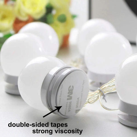 Close-up of double-sided tape on Hollywood Style LED Vanity Lights Kit With 14 Dimmable Bulbs And AC Adapter Stick On Makeup Lights.