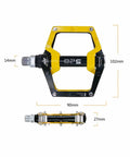 Yellow and black aluminum mountain bike pedals flat pedals for MTB and BMX with removable non-slip studs nine sixteenths inch spindle