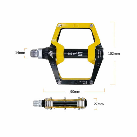 Yellow and black aluminum mountain bike pedals flat pedals for MTB and BMX with removable non-slip studs nine sixteenths inch spindle