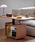Heavy Duty Pneumatic Vertical Lifter With Wire Control Buttons And Adjustable Push Rod Lift Thickened Steel Construction For Rock Solid Load Capacity That Makes Everyday Setup A Total Breeze in a modern workspace with laptop and decor.