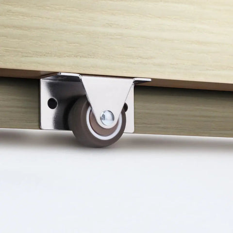Side view of Four Pack Slim Side Mounted Flat Bottom Caster Wheels One And One Quarter Inch for furniture with steel bracket.