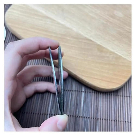 65mm Diamond Cutting Disc For Dry And Wet Grinding, Double Sided Saw Blade For Ceramic Tile And Granite, Diamond Grinding Plate, Pro Grade, Heavy Duty, Durable Grinder Tool For Smooth Flat Cuts, side view in hand