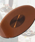Big Time Tempered Glass Lazy Susan Solid Round Swivel Turntable Top Shelf Rotating Serving Tray Heavy Duty Dinner Plate Stand Safe Rounded Edge 360 Degree Smooth Spin Platform For Cookout Suppers on a dining table.