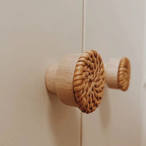 Side view of Six Piece Dope Boho Rattan Knobs For Dresser Drawers And Cabinets Handmade Wicker Woven Decorative Pulls In Caramel Color