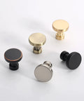 Assorted metal cabinet knobs including 10 Pack Champagne Bronze Kitchen Cabinet Knobs And Pulls Single Hole Round Gold Drawer Knobs For Bathroom Cabinets Easy Install Hardware Set Durable Metal Finish Model K0012.