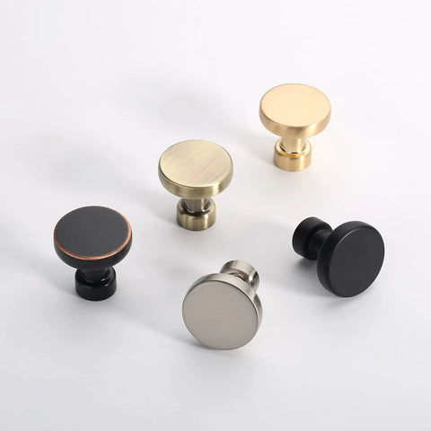Assorted metal cabinet knobs including 10 Pack Champagne Bronze Kitchen Cabinet Knobs And Pulls Single Hole Round Gold Drawer Knobs For Bathroom Cabinets Easy Install Hardware Set Durable Metal Finish Model K0012.