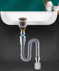 Copper Wash Basin Drain Plug, With drain hole, With drain hole A installed under a sink featuring a flexible drainage pipe.