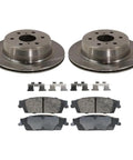 Brake rotor and pad kit: two steel rotors, four brake pads, and mounting hardware clips