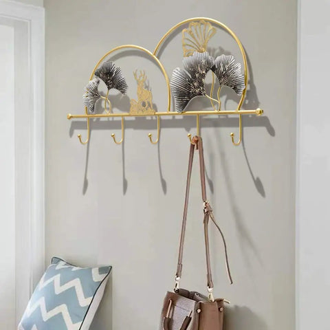 Heavy Duty Wall Mounted Coat Rack Hella Sturdy Iron Double Hooks For Entryway Mudroom Bathroom Rust Proof Finish No Fuss Setup Organizer For Coats Jackets Bags And Umbrella Daily Drivers with decorative design on wall.