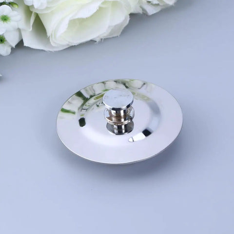 Drain Stopper Flat Cover 40-45mm Stainless Steel for Bathtub with polished surface and central knob. Ideal for sealing drains.