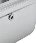 Close-up of heavy duty stainless steel espresso knock box with deep shock absorbing basin showcasing a corner detail.