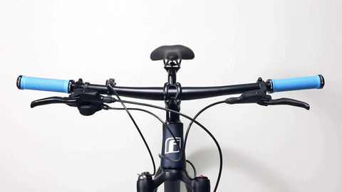 Bike Handlebar Grips Dual Lock-On Clamps, blue ergonomic rubber and aluminum alloy, non slip, on bicycle, front view.