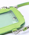Close-up of a green transparent pouch with zipper and strap, ideal for securely holding small electronic devices or accessories.
