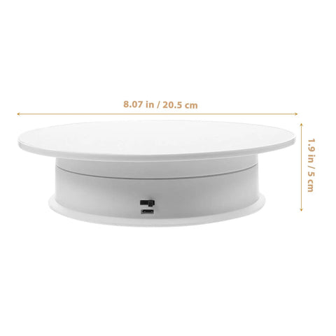 Electric Rotating Display Turntable For Jewelry And Watches With Adjustable Speed Rotation Anti Skid Base shown from side with dimensions 8.07 in x 1.9 in.
