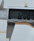 Digital caliper measuring 12.08mm showing precision measurement for Real Deal White Nylon Hex Standoff 100 Pack M3x12mm.