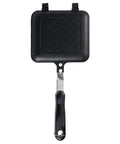 Durable Aluminum Grilled Sandwich Maker For Stovetop Use. Non-Stick Toastie Press Grill with black handle and square plates.