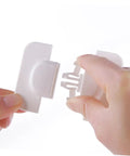 Hands installing Six Pack Child Safety Locks For Cabinets And Refrigerators Easy To Install White Latches Durable Kitchen Safety