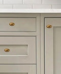 Antique Brass Cabinet Knobs 10 Pack 1-3/8 Inch Oval Drawer Knobs for cabinets and drawers, installed in kitchen setting