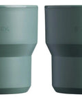 Pair of green insulated cups from the Go 4 Piece Stainless Steel Camp Cook Set With 32 Ounce Pot And Lid Fold And Lock Handle Includes Two Stacking Cups