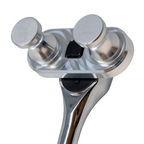 Close-up of Rack-A-Tiers Bend-All Sr Ratchet Cable Wire Bender Tool showing aluminum gripping mechanism for wire bending.