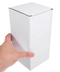 Person holding one box from 10 Pack White Corrugated Cardboard Shipping Boxes With High Durability And Stable Weight Support For Small Business