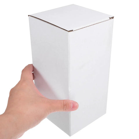 Person holding a 10 Pack White Corrugated Cardboard Shipping Box, showing lightweight structure and sturdy corners for easy mailing.
