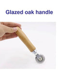 Close-up of Precise 0.5mm Cardboard Scoring Tool with glazed oak handle and durable metal wheel