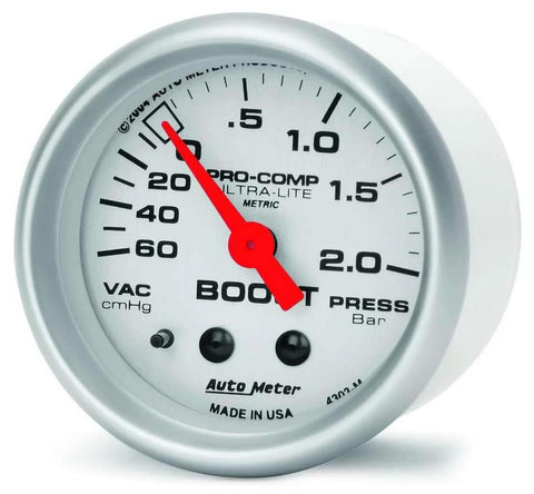 Front view of Auto Meter 4303 Ultra-Lite mechanical boost/vacuum gauge, 2.3125 in, silver housing, red needle.