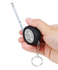 Two Piece Measuring Wheel And Retractable Tape Featuring Cm And Foot Dial And Heavy Duty Click Lock for fast measurements in hand.