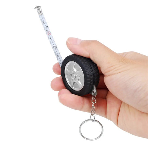Two Piece Measuring Wheel And Retractable Tape Featuring Cm And Foot Dial And Heavy Duty Click Lock for fast measurements in hand.