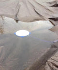Pool Cover Drainer Kit For Above Ground Pools Premium Siphon With 16 Feet Hose And Pump in use on a pool cover