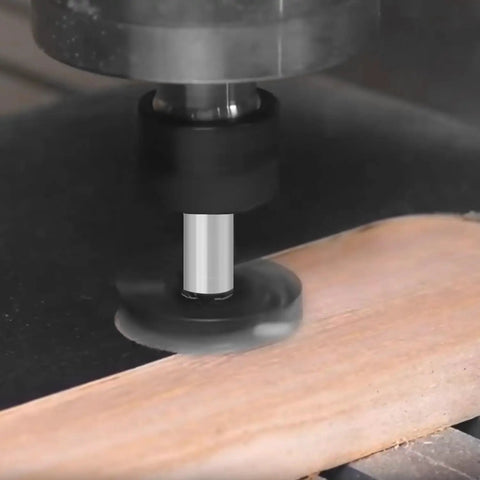 CNC machine using Slab Flattening Router Bit Heavy Duty With One Quarter Inch Shank, One And Three Eighths Inch Cutting Diameter on wood.