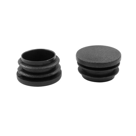 Two of the Four Pack One And A Quarter Inch Round Plastic Hole Plugs Black End Caps For Round Metal Tubes displayed open and closed.