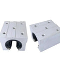4 Pack Aluminum Block 20mm Linear Motion Ball Bearing Slide Block Set For SBR20 Linear Guide Rails, High Precision Smooth Movement, Durable Aluminum Blocks For DIY CNC And Robotics. Two aluminum SBR20 linear bearing blocks shown at different angles