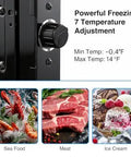 Game Changer 2.3 Cubic Foot Compact Upright Freezer With Seven Flexible Temperature Settings showing temperature dial and frozen seafood, meat, and ice cream.