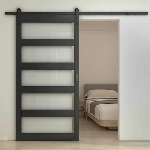 Front view of 48 Inch By 84 Inch 5 Lite Tempered Frosted Glass Sliding Barn Door With Black Finish Composite Interior Hardware Kit And Rail System Left Or Right Mount Easy Assembly Dope Modern Farmhouse Vibe installed in bedroom.