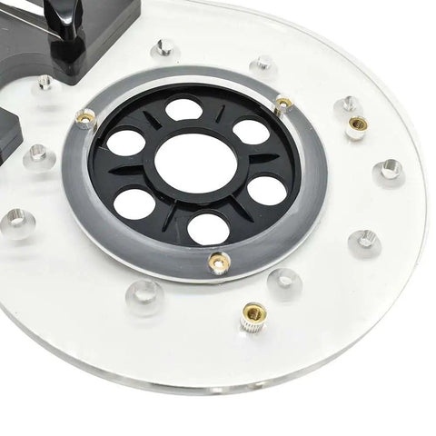 Universal Offset Router Base Plate For Precision Woodworking clear acrylic foot with black center and mounting holes for routers.