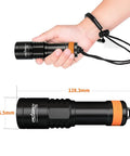 Hand holding a D580 Scuba Dive Light 530 Lumens Underwater Flashlight With 6 Degree Narrow Beam IP68 for size comparison.